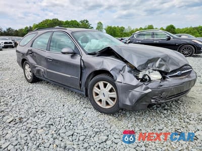 Czwarte zdjęcie samochodu z boku: 2003 FORD TAURUS SEL VIN:1FAFP59S83A234799 - miniatura