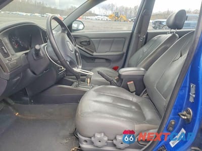 Zdjęcie 7 z 11 samochodu: 2004 HYUNDAI ELANTRA GT VIN:KMHDN56D64U119644 - miniatura