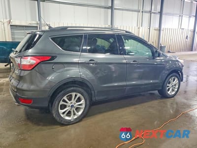 Trzecie zdjęcie samochodu z tyłu: 2018 FORD ESCAPE SE VIN:1FMCU0GDXJUC69221 - miniatura