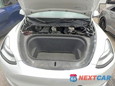 Zdjęcie 7 z 10 samochodu: 2022 TESLA MODEL Y VIN:7SAYGAEE4NF324475 - miniatura