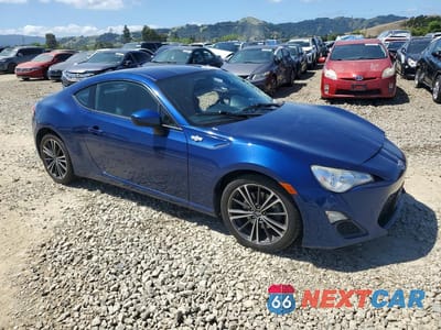 Czwarte zdjęcie samochodu z boku: 2014 SCION FR-S BASE VIN:JF1ZNAA1XE9710120 - miniatura