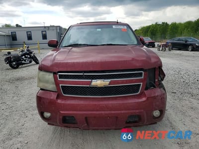 Piąte zdjęcie samochodu w środku: 2010 CHEVROLET TAHOE K1500 LT VIN:1GNUKBE03AR123456 - miniatura