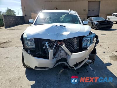 Piąte zdjęcie samochodu w środku: 2016 GMC YUKON DENALI VIN:1GKS1CKJ5GR364003 - miniatura
