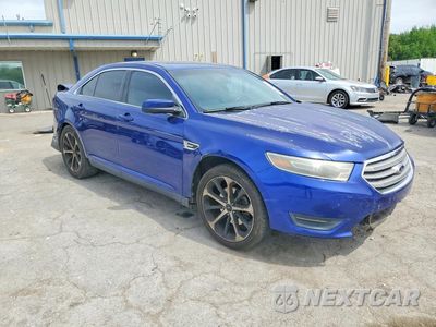 Czwarte zdjęcie samochodu z boku: 2014 FORD TAURUS SEL VIN:1FAHP2E85EG184641 - miniatura
