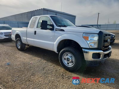 Czwarte zdjęcie samochodu z boku: 2015 FORD F250 SUPER DUTY VIN:1FT7X2B6XFED37570 - miniatura