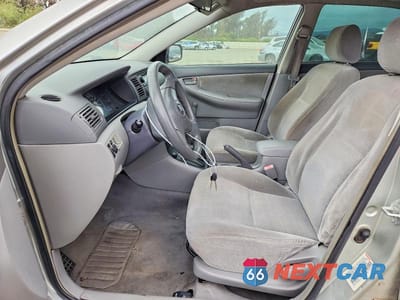 Zdjęcie 7 z 11 samochodu: 2003 TOYOTA COROLLA CE VIN:JTDBR32E730043246 - miniatura