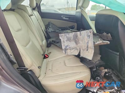 Zdjęcie 11 z 13 samochodu: 2022 FORD EDGE TITANIUM VIN:2FMPK4K93NBA32891 - miniatura
