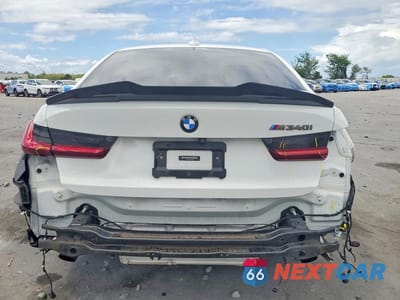 Zdjęcie 6 z 13 samochodu: 2022 BMW M340I VIN:3MW5U7J09N8C24024 - miniatura