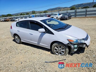 Czwarte zdjęcie samochodu z boku: 2010 HONDA INSIGHT EX VIN:JHMZE2H71AS036189 - miniatura