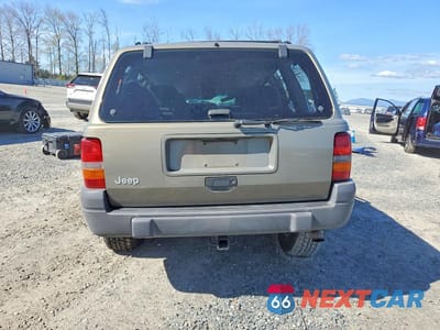 Zdjęcie 6 z 13 samochodu: 1998 JEEP GRAND CHEROKEE LAREDO VIN:1J4GZ58S0WC110636 - miniatura