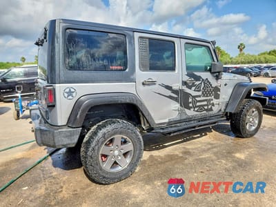 Trzecie zdjęcie samochodu z tyłu: 2013 JEEP WRANGLER UNLIMITED SPORT VIN:1C4BJWDG4DL628857 - miniatura