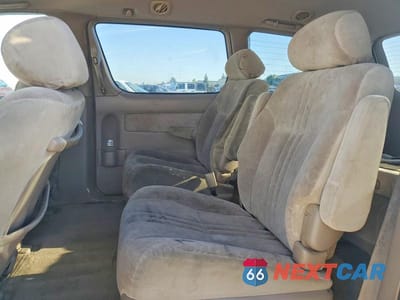 Zdjęcie 11 z 12 samochodu: 1999 TOYOTA SIENNA LE VIN:4T3ZF13C3XU145671 - miniatura