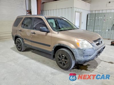 Czwarte zdjęcie samochodu z boku: 2002 HONDA CR-V LX VIN:JHLRD78452C069928 - miniatura