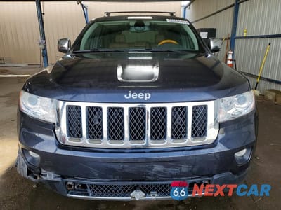 Piąte zdjęcie samochodu w środku: 2013 JEEP GRAND CHEROKEE OVERLAND VIN:1C4RJFCT9DC525494 - miniatura