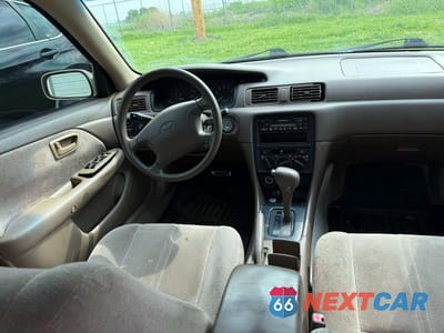 Zdjęcie 9 z 12 samochodu: 1999 TOYOTA CAMRY LE VIN:4T1BG22KXXU896076 - miniatura
