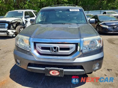 Piąte zdjęcie samochodu w środku: 2011 HONDA PILOT EXL VIN:5FNYF3H56BB006392 - miniatura