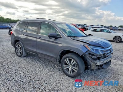 Czwarte zdjęcie samochodu z boku: 2017 HONDA PILOT EXL VIN:5FNYF5H55HB017016 - miniatura