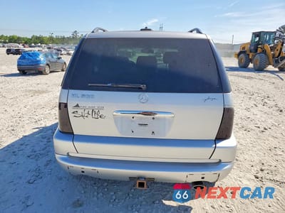 Zdjęcie 6 z 13 samochodu: 2002 MERCEDES-BENZ ML 500 VIN:4JGAB75E72A324616 - miniatura