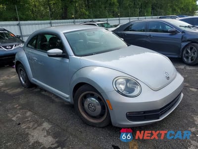 Czwarte zdjęcie samochodu z boku: 2012 VOLKSWAGEN BEETLE VIN:3VWJP7AT6CM601896 - miniatura