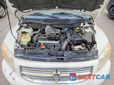 Zdjęcie 12 z 13 samochodu: 2009 DODGE CALIBER SXT VIN:1B3HB48A29D196886 - miniatura