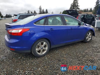 Trzecie zdjęcie samochodu z tyłu: 2014 FORD FOCUS TITANIUM VIN:1FADP3J20EL230468 - miniatura