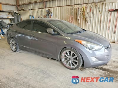 Czwarte zdjęcie samochodu z boku: 2012 HYUNDAI ELANTRA LIMITED VIN:5NPDH4AE1CH091671 - miniatura
