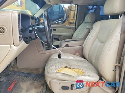 Zdjęcie 7 z 13 samochodu: 2003 GMC YUKON VIN:1GKEC13Z73R123795 - miniatura