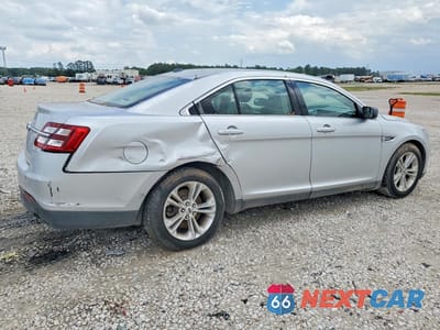 Trzecie zdjęcie samochodu z tyłu: 2016 FORD TAURUS SE VIN:1FAHP2D89GG147189 - miniatura