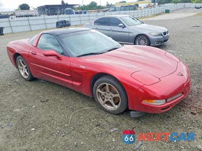 Czwarte zdjęcie samochodu z boku: 2002 CHEV CORVETTE VIN:1G1YY22G025112118 - miniatura