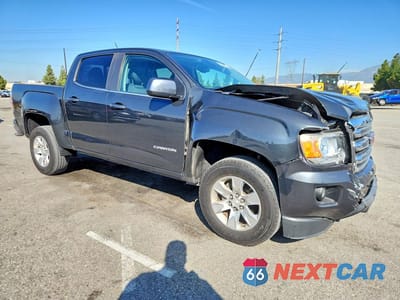 Czwarte zdjęcie samochodu z boku: 2016 GMC CANYON SLE VIN:1GTG5CE36G1390322 - miniatura