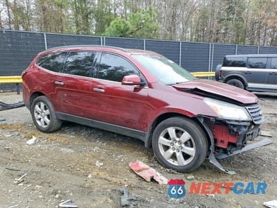 Czwarte zdjęcie samochodu z boku: 2016 CHEVROLET TRAVERSE LT VIN:1GNKRGKD6GJ219516 - miniatura