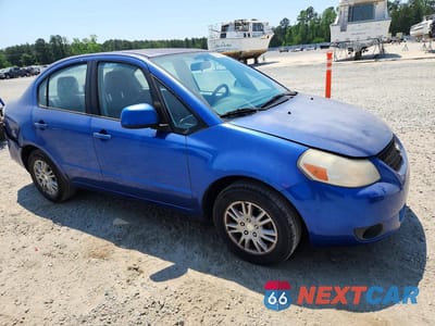 Czwarte zdjęcie samochodu z boku: 2013 SUZUKI SX4 LE VIN:JS2YC5A35D6100359 - miniatura