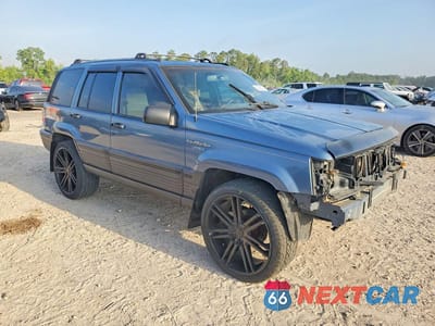 Czwarte zdjęcie samochodu z boku: 1995 JEEP GRAND CHEROKEE LAREDO VIN:1J4GZ58S3SC581352 - miniatura