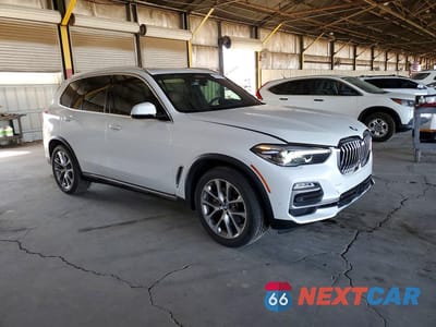 Czwarte zdjęcie samochodu z boku: 2020 BMW X5 SDRIVE 40I VIN:5UXCR4C09L9C89323 - miniatura