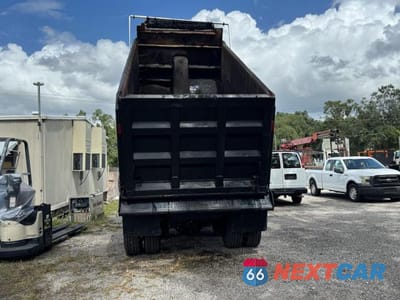 Zdjęcie 6 z 12 samochodu: 2003 VOLVO VHD DUMP TRUCK VIN:4V5KC9GH33N347488 - miniatura