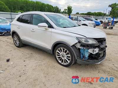 Czwarte zdjęcie samochodu z boku: 2017 LINCOLN MKC RESERVE VIN:5LMCJ3C90HUL12094 - miniatura
