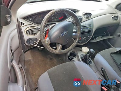 Zdjęcie 8 z 13 samochodu: 2004 FORD FOCUS LX VIN:1FAFP33P14W132192 - miniatura