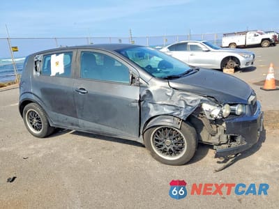 Czwarte zdjęcie samochodu z boku: 2016 CHEVROLET SONIC LS VIN:1G1JB6SH9G4122680 - miniatura