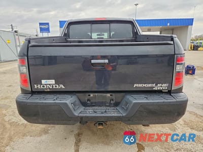 Zdjęcie 6 z 13 samochodu: 2013 HONDA RIDGELINE RTS VIN:5FPYK1F48DB015387 - miniatura