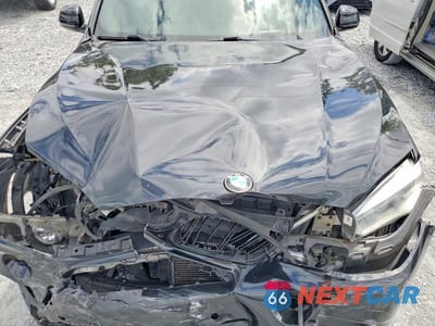 Zdjęcie 12 z 13 samochodu: 2014 BMW X5 SDRIVE35I VIN:5UXKR2C59E0H31634 - miniatura