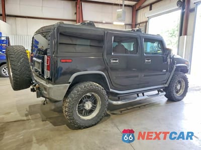 Trzecie zdjęcie samochodu z tyłu: 2004 HUMMER H2 VIN:5GRGN23U54H121073 - miniatura