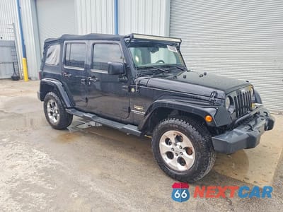 Czwarte zdjęcie samochodu z boku: 2015 JEEP WRANGLER UNLIMITED SAHARA VIN:1C4HJWEG6FL528447 - miniatura