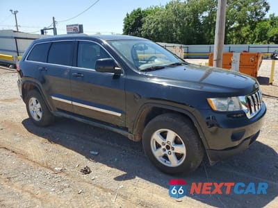 Czwarte zdjęcie samochodu z boku: 2011 JEEP GRAND CHEROKEE LAREDO VIN:1J4RR4GG4BC567234 - miniatura