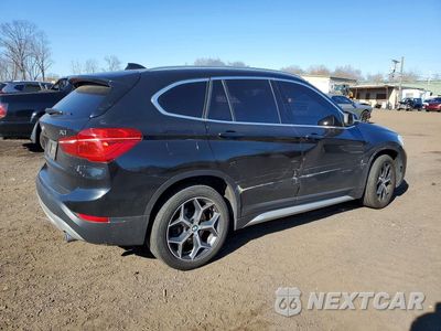 Trzecie zdjęcie samochodu z tyłu: 2018 BMW X1 XDRIVE28I VIN:WBXHT3C30J5F89997 - miniatura
