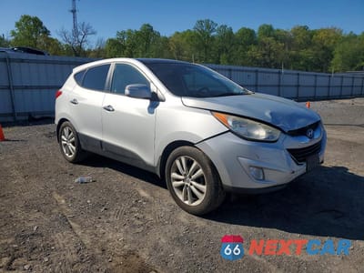 Czwarte zdjęcie samochodu z boku: 2013 HYUNDAI TUCSON LIMITED VIN:KM8JUCAC8DU727965 - miniatura