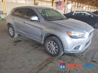 Czwarte zdjęcie samochodu z boku: 2012 MITSUBISHI OUTLANDER SPORT ES VIN:JA4AP3AU2CZ011403 - miniatura