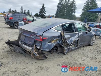 Trzecie zdjęcie samochodu z tyłu: 2019 TESLA MODEL 3 VIN:5YJ3E1EB8KF438428 - miniatura