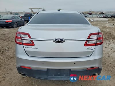 Zdjęcie 6 z 11 samochodu: 2016 FORD TAURUS SEL VIN:1FAHP2H87GG111706 - miniatura