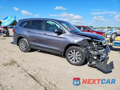 Czwarte zdjęcie samochodu z boku: 2022 HONDA PILOT EXL VIN:5FNYF5H58NB006605 - miniatura