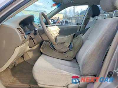 Zdjęcie 7 z 13 samochodu: 2000 TOYOTA COROLLA VE VIN:2T1BR12E3YC322744 - miniatura